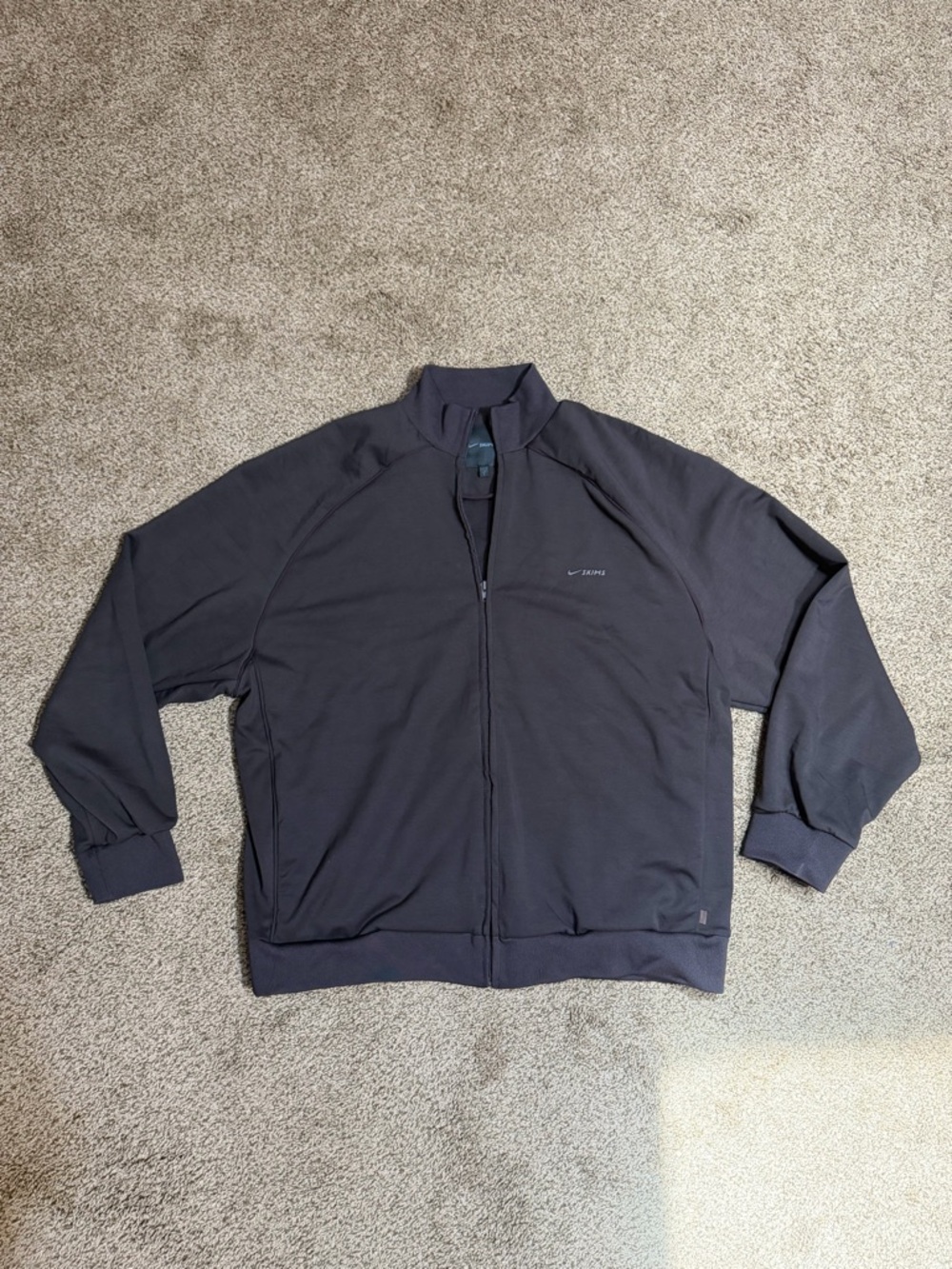 NWOT NikeSKIMS Matte Tricot
Women's Oversized Full-Zip Track Jacket